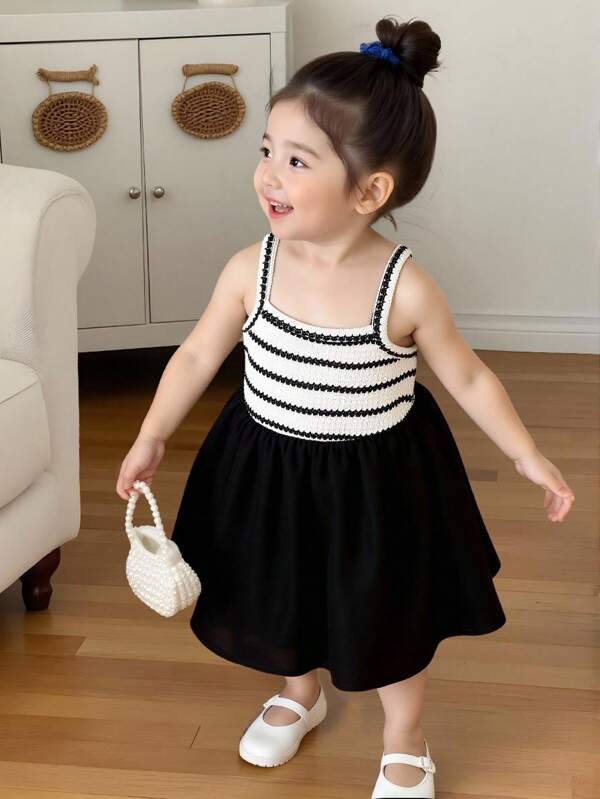 Souflis Souflis Baby Girls' Casual Suspender A-Line Dress. This Dress Features Suspender Design, Simple Yet Elegant. The A-Line Silhouette Exudes A Lively And Cute Vibe. The Relaxed Fit Is Suitable For Babies Of All Body Types. It Is Perfect For Summer Activities Like Beach Trips, Outdoor Picnics, As Well As Casual Indoor Wear, Allowing Babies To Enjoy Carefree Moments While Showcasing Their Unique Charm.