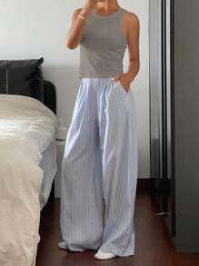 DAZY Conjunto de pijama para mujer con top tipo camiseta de unicolor simple y pantalón holgado a rayas