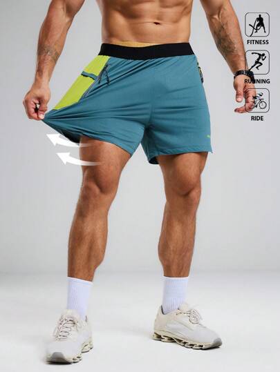 Manfinity Sport Polished 男士松紧腰撞色拉链斜口袋运动短裤，适合健身、跑步、骑行