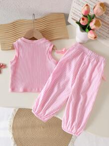 Set di abbigliamento per neonata in stile coreano casual e carino, con maglietta in maglia a scollo a V tinta unita e pantaloni lunghi a righe rosa in tessuto, abbigliamento esterno