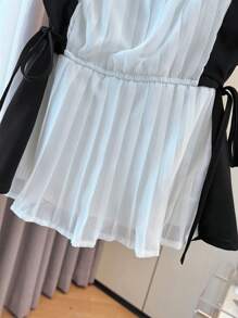 Franclia Women's Elegant Commuting Sleeveless Contrast Color Pleated Shirt - Black and White - View 6