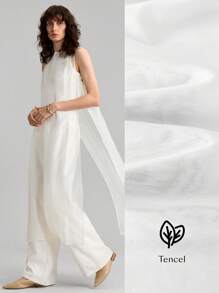 Ontre 2025 New See-Through Sleeveless Crew Neck Top With Side Button, Fashionable Daily Wear, Versatile For All Seasons, Bohemian Style Beach/Resort, Suitable For Music Festival, Western-Inspired, Premium Comfortable Fabric Modern Urban Casual Fashion Business Casual Women's Office Wear Low-Key Old Money Style Effortless Temperament High-End Urban Commuting High-Quality Airport Women's Wear High-End Material High-End, Elegant, Old-Fashioned Cruise Attire For Wedding Guests