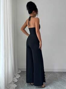 Selianne Tuta elegante da donna con fiore 3D, spalline e schiena scoperta, con spacco - nero - Visualizzare 2