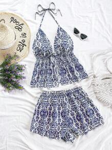 Soleia طقم للنساء مكون من 2 قطع: ملابس علوية كم قصير بياقة على شكل حرف V وشورت فضفاض مريح، بتصميم ذو طراز رجعي، شكل كلاسيكي عصري، مناسب للمناسبات والسهرات والشارع والعطلات - ازرق وابيض - مشاهدة 6