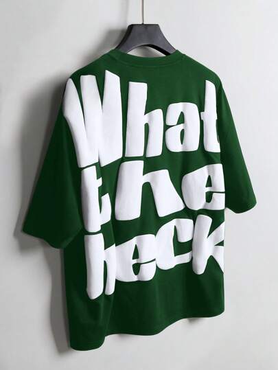 Manfinity EMRG Camiseta casual de cuello redondo con mangas de murciélago y estampado de letras para hombres, un gran regalo para un novio o esposo. Camiseta gráfica verde para hombres, camiseta verde con eslogan, camiseta "¿Qué demonios?" para hombres, camiseta gráfica