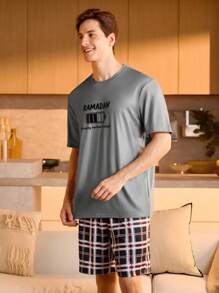 Manfinity Underwear&Sleepwear Basics Men's  Graphic Loungewear Set Comfortable Knitted Fabric Round Neck Short Sleeve T-Shirt With Unique Battery Icon Print And Multicolor Plaid Short Bottoms. Ideal For Relaxed Home Wear.