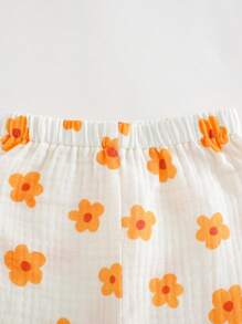 Cozy Pixies Bộ 2 món áo cardigan tay ngắn cổ ve họa tiết hoa cho bé gái và quần cạp chun - Màu be - Xem 7
