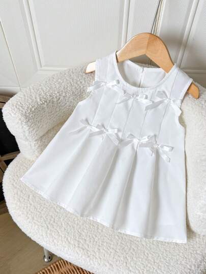 SHEIN Young Girl Casual Minimalist Comfortable Round Neck Sleeveless Top With Bow Decor