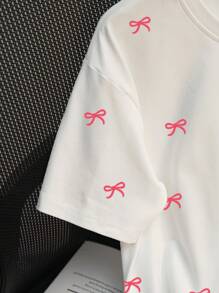SHEIN Camiseta casual de mujer de cuello redondo y manga corta con estampado de moño
