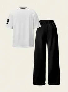 SHEIN Explorewe Conjunto informal de dos piezas de pantalones deportivos de pierna ancha y blusa de manga corta y cuello en V con estampado digital para chica universitaria - Multicolor - Ver 3