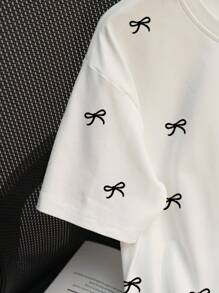 SHEIN Regular Loose Plus Size Women T-Shirt With Bow Knot & Print, Best Seller