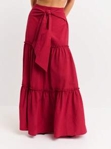 Nöista Tiered Maxi Skirt With Gathered Seams And Oversized Waist Tie. Flowing Silhouette, Boho Style, Romantic, Feminine, Casual Chic, Perfect For Summer, Beachwear, Or Relaxed Everyday Outfits. - Burgundy - View 1