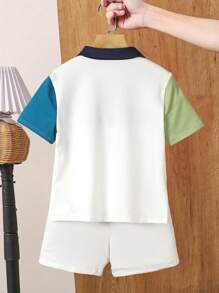 SHEIN 2件套男童拼色Polo领短袖T恤和短裤。T恤面料柔软舒适，触感细腻，Polo领设计增添正式感，四色拼接设计使整体设计更加丰富多彩。简洁大方的短裤设计，搭配T恤，更显时尚。 - 彩色 - 查看 2