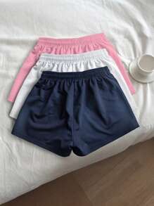 SHEIN Set de 3 pantalones cortos deportivos bordados de colores para mujeres