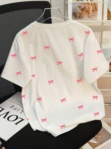 SHEIN Camiseta casual de mujer de cuello redondo y manga corta con estampado de moño