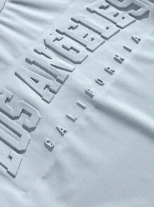 Manfinity Joysei Camiseta de punto con estampado gráfico de letras para hombre en azul claro, apropiada para el verano
