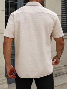 Manfinity Homme Camisa casual de bolsillo de manga corta y de una sola hilera de botones de unicolor para hombres de talla grande