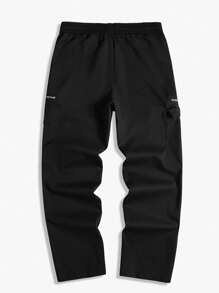 Manfinity Homme Calça Casual Folgada de Rua com Bolsos Cargo e Cordão na Cintura, Cor Sólida - Preto - Visão 2