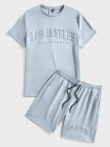 Manfinity Joysei Camiseta de punto con estampado gráfico de letras para hombre en azul claro, apropiada para el verano