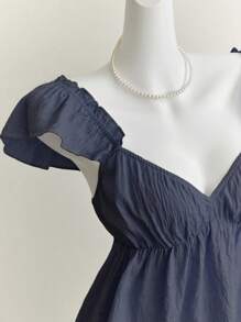 Elamini 蓝色甜美女仆风格荷叶边性感低背细肩带短款上衣