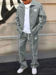 Manfinity EMRG Conjunto de chaqueta de manga larga y pantalones con estampado minimalista para hombre. Conjunto de chándal para hombre, conjunto de jogger de 2 piezas para hombre, diseño de contraste, ropa de otoño