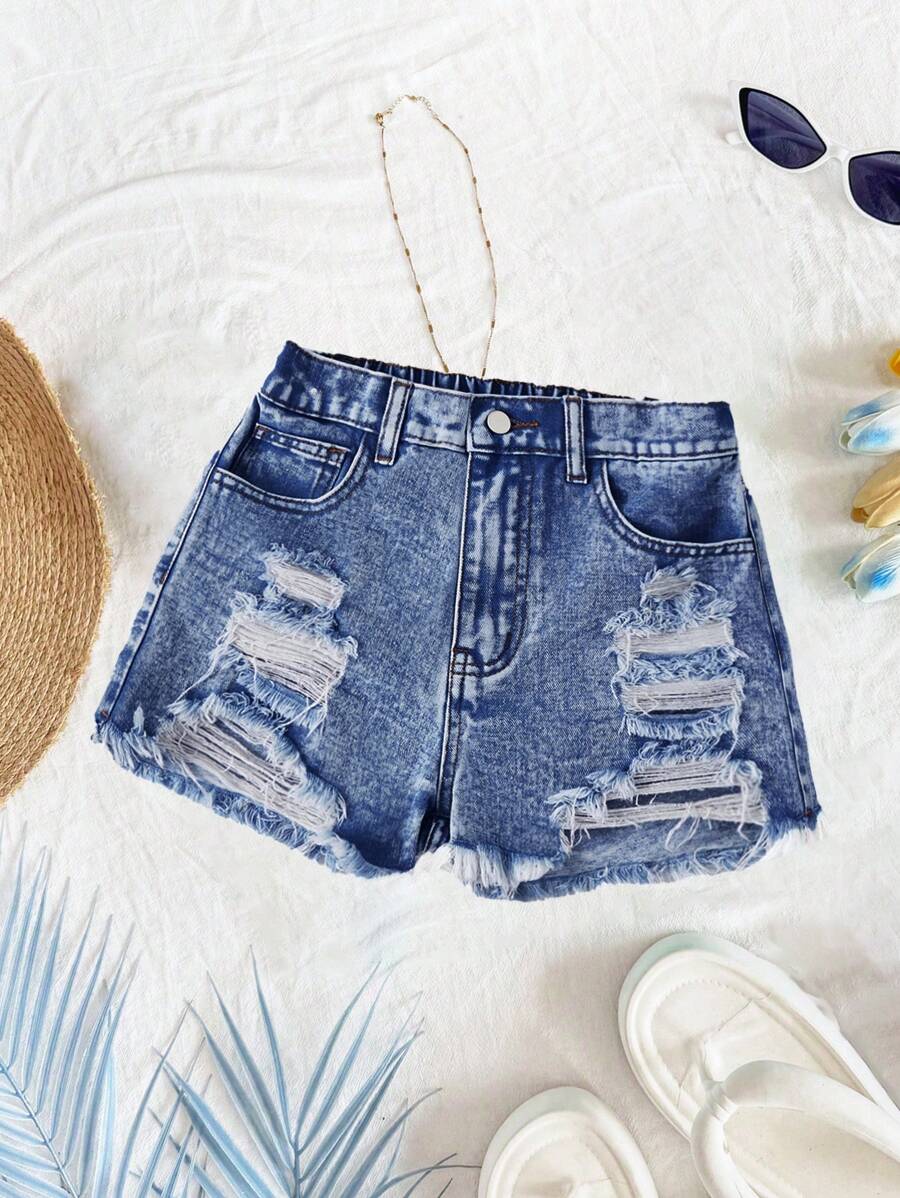 SHEIN Tween Girl Y2K 春夏假期水洗高腰破洞毛边牛仔短裤,毛边下摆,夏季海滩波西米亚风度假短裤,夏季音乐会节日休闲狂欢,女孩夏季早午餐毕业 - 中等水洗藍 - 查看 1