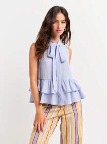 Nöista 无袖荷叶边上衣，领口系蝴蝶结，下摆呈荷叶边设计。飘逸柔美，是海滩度假、机场出行或七月四日及骄傲节庆祝活动的理想之选。轻盈透气。 - 紫色 - 查看 1