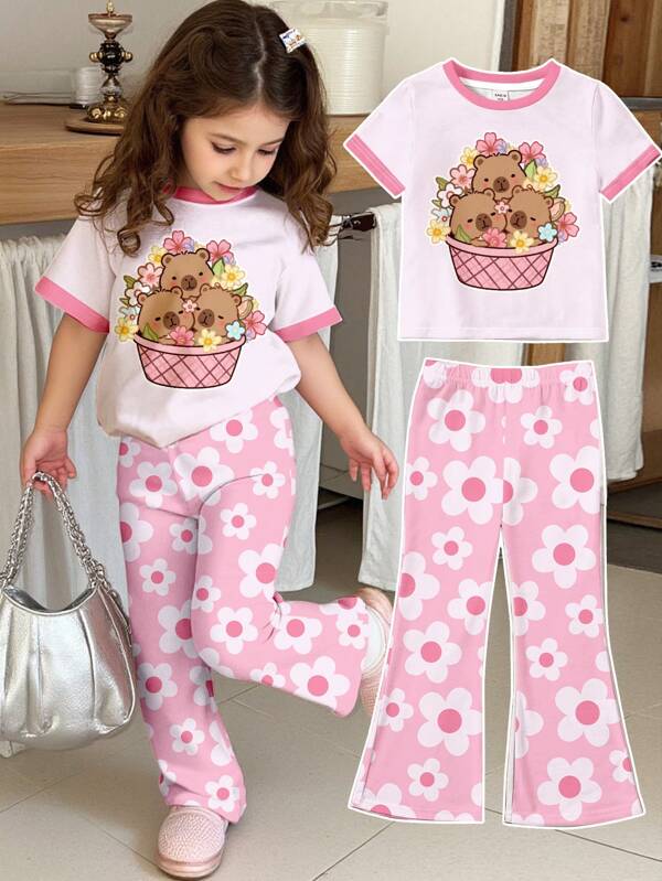 SHEIN Set de 2 piezas con parte superior de manga corta y cuello redondo con diseño de capibaras y flores, y pantalones campana para niñas jóvenes, para verano