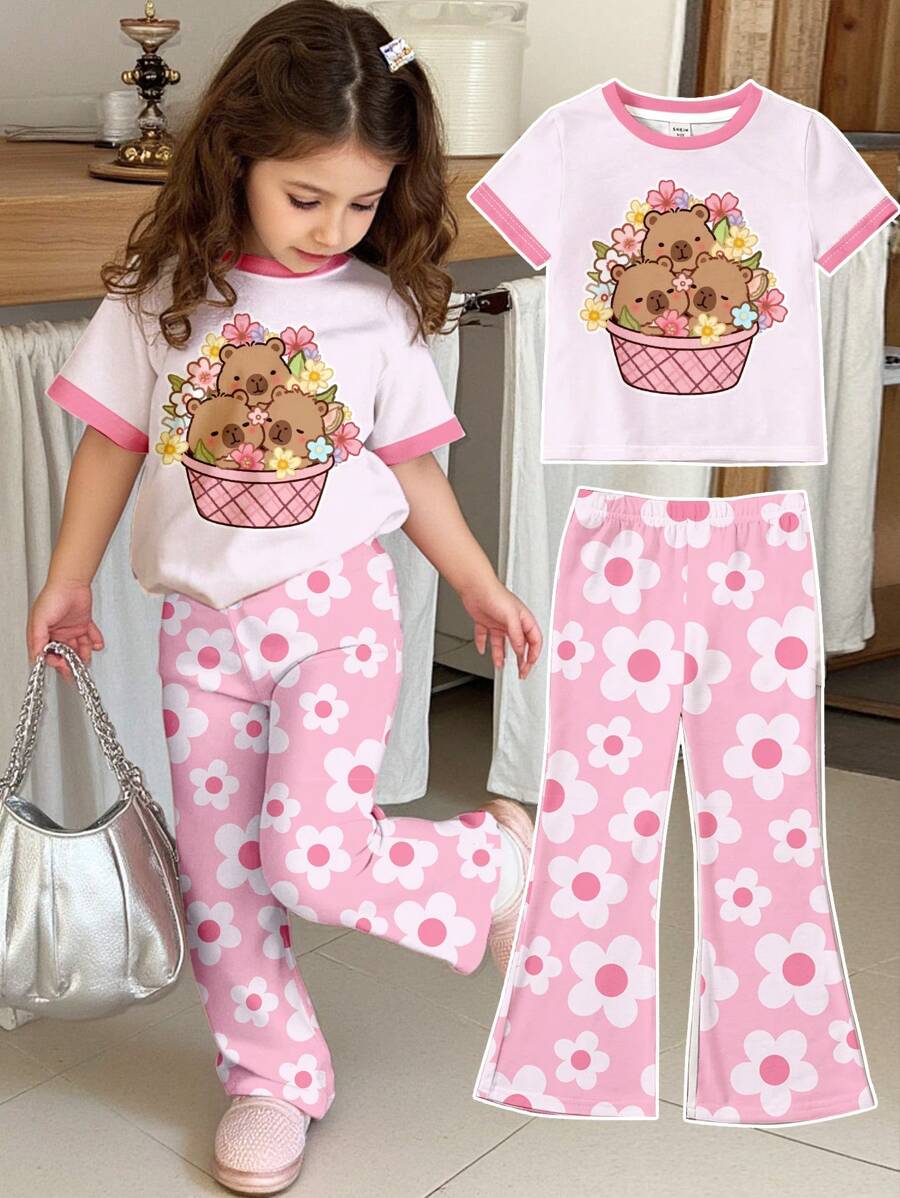 SHEIN 2 件套可爱水豚和花卉印花设计休闲卡通图案圆领短袖上衣和喇叭裤，适合年轻女孩，夏季