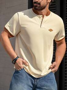 Manfinity Homme Camisa casual de manga corta con botones y parches de unicolor para hombres de talla grande