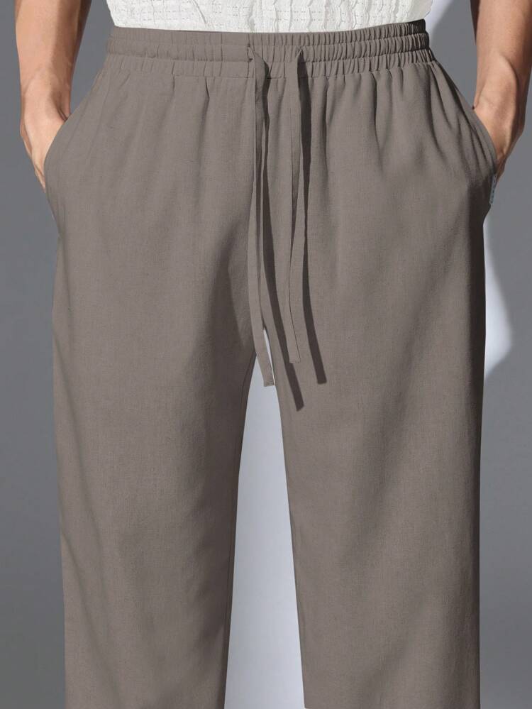 SUMWON Regular Fit Corduroy Pants With Draw Strings,Men's Dark Brown Loose Fitting Casual Pants | Fashion Sports Style | Comfortable And Breathable Fabric, Suitable For Daily Wear | Modern Cut Design, Perfect For Various Occasions | Easily Paired With Sneakers And Casual Tops.