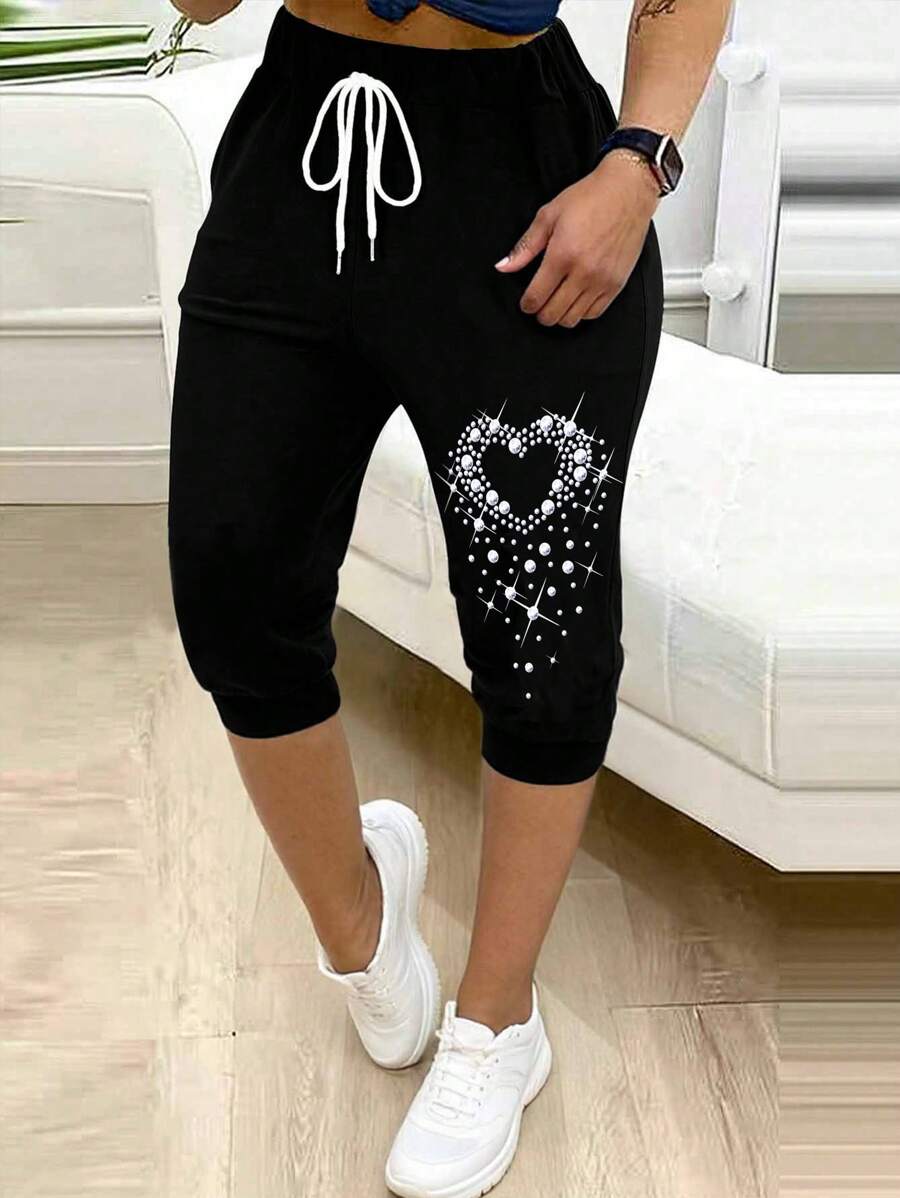 SHEIN LUNE Pantalones casuales de 3/4 de largo con cintura de cordón y estampado de corazón de perlas artificiales para mujer