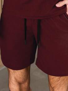 Manfinity Homme 2 sztuki/zestaw męska koszulka polo i spodenki w jednolitym kolorze, swobodny minimalistyczny styl odpowiedni na lato