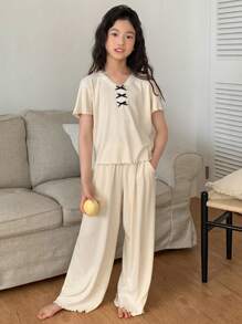 DAZY طقم تيشيرت كنزة قصير الأكمام وبنطلون طويل بقصة عنق دائرية للبنات المراهقات ، ملابس منزلية كاجوال للصيف، قطعتان