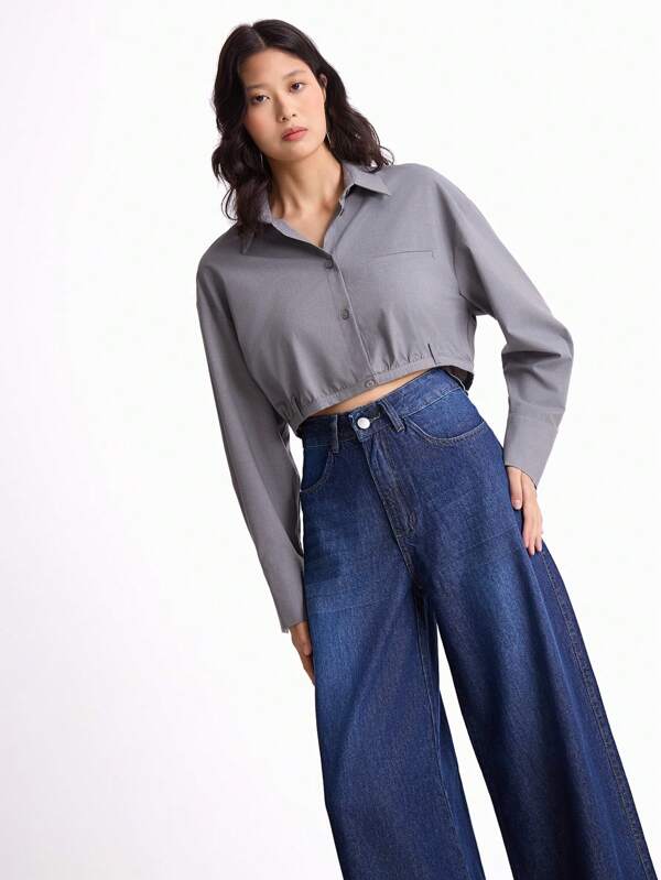 Daynim Calça Denim Perna Larga com Botão Frontal Sólido