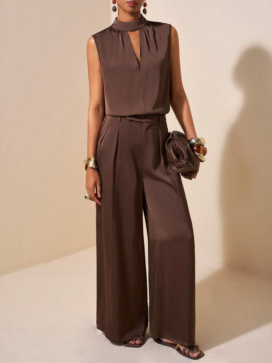 Zivah Set de 2 piese: Bluză fără mâneci cu volane și guler înalt și pantaloni de costum, din material satinat maro cu aspect de raion, asemănător inului, potrivit pentru festivaluri de muzică, Paște, Ziua Sfântului Patrick, stil occidental, stil nomad, petreceri de ziua de naștere, absolviri, stil universitar, ținute casual de zi cu zi, vacanță, călătorii în croazieră, plajă, bronzare, la modă, ținute streetwear, stil boem pentru invitați la nuntă, naveta, brunch, ținute de aeroport. - Maro - Vizualizare 1