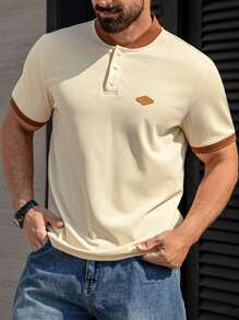 Manfinity Homme Camisa casual de manga corta con botones y parches de unicolor para hombres de talla grande