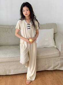 DAZY طقم تيشيرت كنزة قصير الأكمام وبنطلون طويل بقصة عنق دائرية للبنات المراهقات ، ملابس منزلية كاجوال للصيف، قطعتان