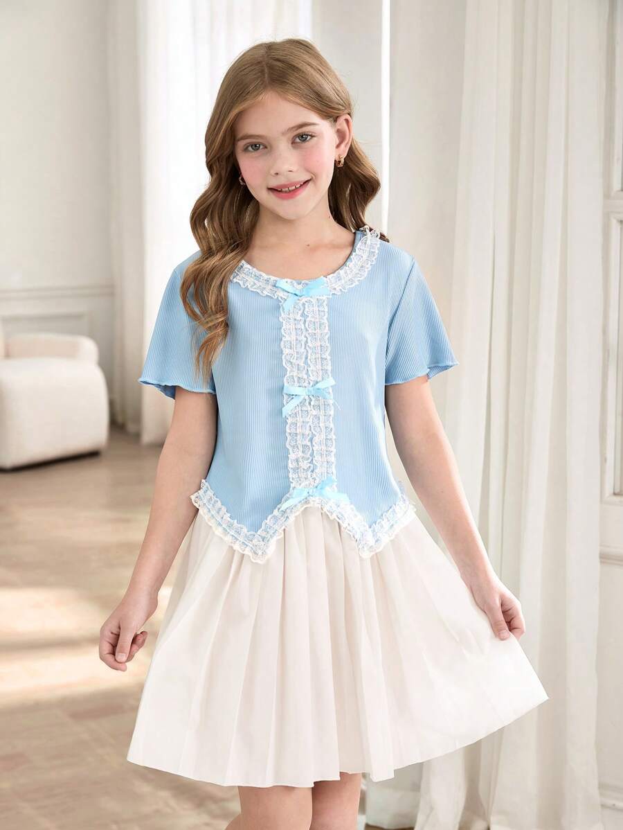 SHEIN Bộ 2 món cho bé gái tuổi mới lớn: Áo thun cổ tròn tay ngắn dệt kim gân và chân váy mini xếp ly cạp chun thoải mái - Màu xanh lam - Xem 1