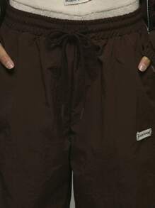 Musera Sport 宽腿尼龙松紧腰带标志直筒裤，适合板网球、网球、泡菜球健身房健身