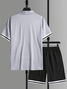 Manfinity Homme 2 pièces Ensemble décontracté pour hommes composé d'un t-shirt zippé à demi-zip avec poignets contrastés et d'un short à cordon de serrage