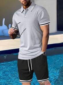 Manfinity Homme 2 pièces Ensemble décontracté pour hommes composé d'un t-shirt zippé à demi-zip avec poignets contrastés et d'un short à cordon de serrage