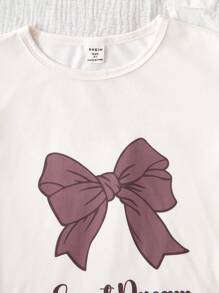 2 件套女童可爱蝴蝶结印花休闲圆领短袖上衣和荷叶边下摆 3/4 裤家居服套装