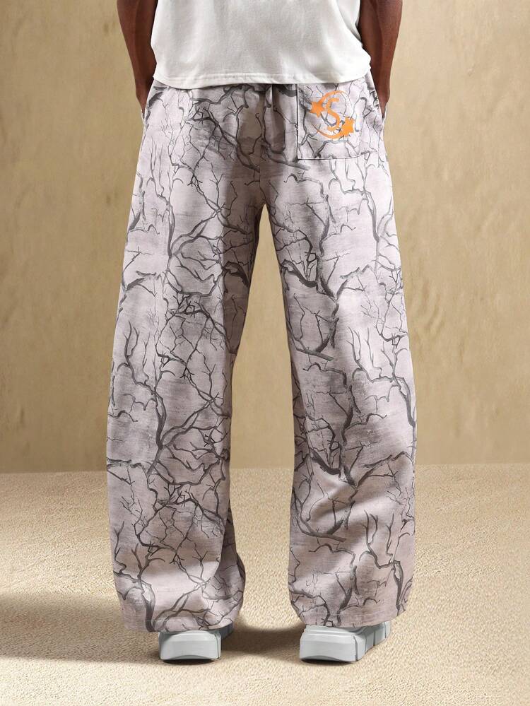 Pantaloni da casa a gamba larga con stampa marmorizzata
