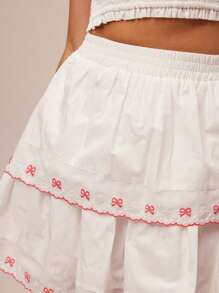 WESTFADE Gonna mini a-line con vita arricciata, fiocco, ricamo e volant a balze, stile country western, adatta per concerti a Nashville, brunch, vacanze al mare in stile boho - Bianco - Visualizzare 4