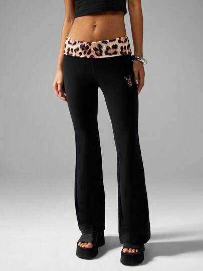 Missguided x Playboy Leopardmönstrade yogabyxor i midjan, hög midja, utsvängda byxor, dansstudio, loungekläder, höst/vintermode, Y2K, retro, klockade byxor, vardagskläder, fritidskläder