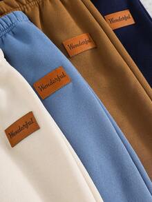 SHEIN 4-częściowy zestaw młodzieżowy dla chłopców, wygodny, modny, prosty i praktyczny, dopasowujący się do każdego stroju, z dekoracją Zhangzai, miękki, wygodny, gruby, spodnie, zestaw szkolny dla chłopców, pasujące do rodziny, na przyjęcie urodzinowe, odpowiedni do codziennego życia, odpowiedni do szkoły, odpowiedni do podróży, odpowiedni do uprawiania sportu, odpowiedni na jesień i zimę