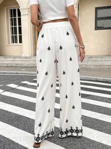 SHEIN Frenchy Pantalones casuales de mujer con cordón, estampado retro de hojas y formas geométricas