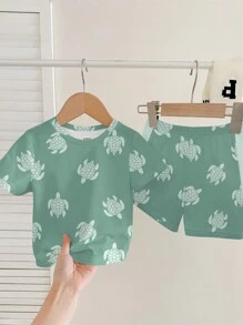 2pcs Young Boy Casual Cute Cartoon Turtle Graphic Round Neck Short Sleeve T-Shirt And Shorts Outfit, Fashionable Summer Set