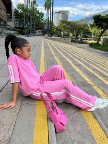 Conjunto informal de niña preadolescente para uso diario escolar, conjunto de Top suelta de cuello redondo con ribete de cinta a contraste y pantalón de chándal a juego, color rosa claro